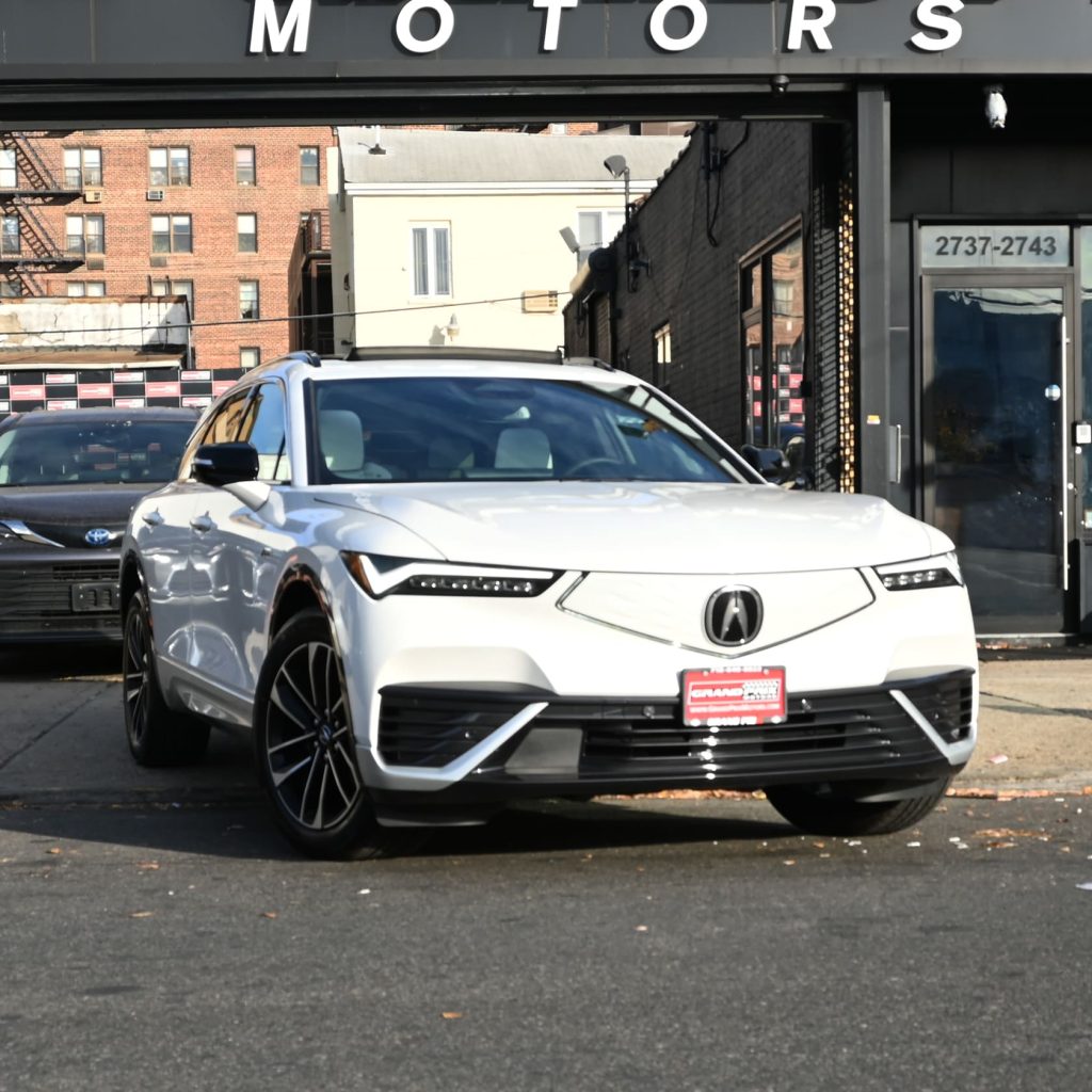 Front view of the 2024 Acura ZDX Type S with illuminated Diamond Pentagon grille and Chicane™ LED lights