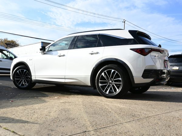 Rear view of the 2024 Acura ZDX featuring signature LED taillights.
