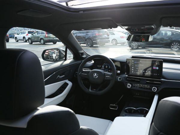 Interior dashboard of the 2024 Acura ZDX with a digital instrument cluster.