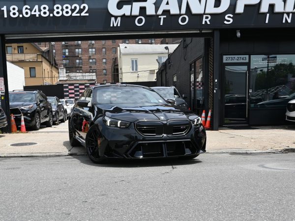 BMW M5 Hybrid in Sport Plus mode, displaying aggressive throttle response and performance settings.