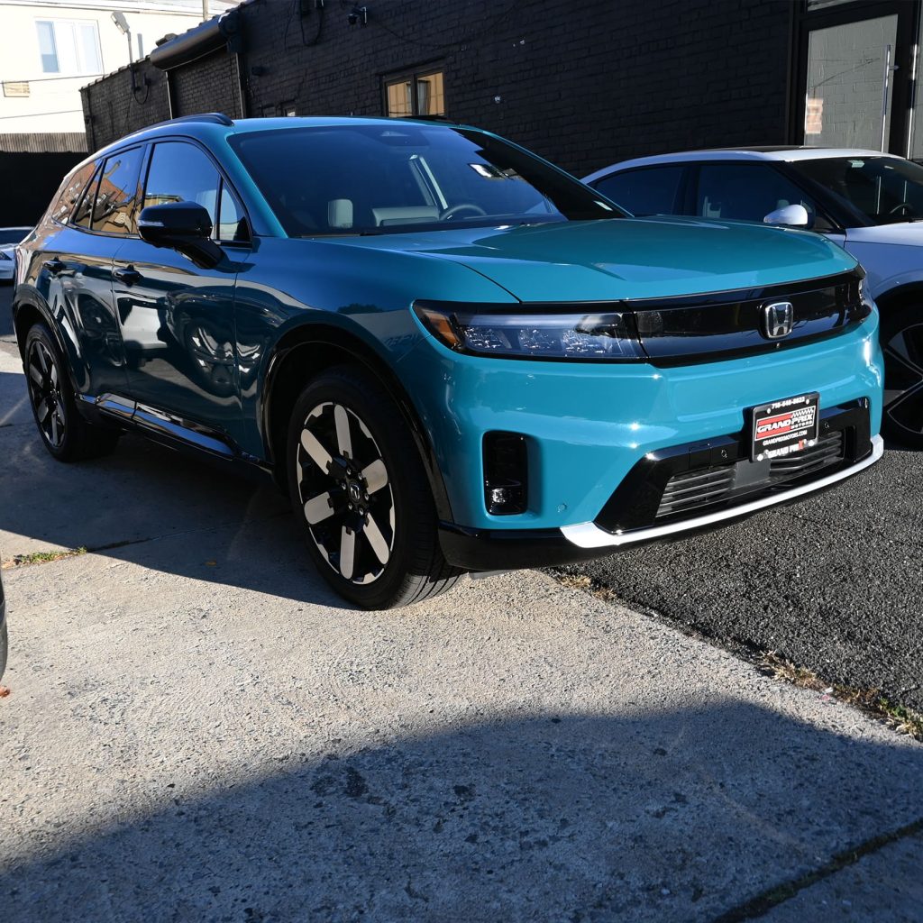 Front view of the 2025 Honda Prologue showcasing its bold grille and LED headlights.