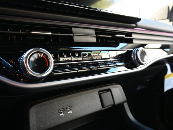 Close-up of the Prologue’s digital driver display showing EV range and navigation.