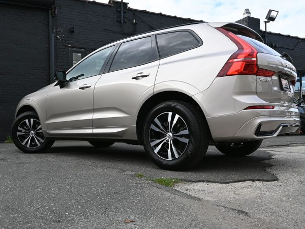 2025 Volvo XC60 parked in an urban setting, showcasing its modern Scandinavian styling.