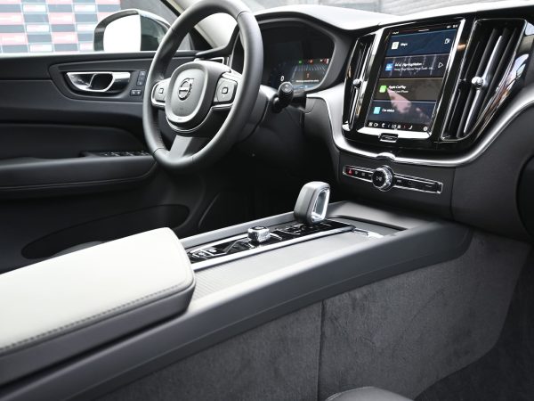 Close-up of the Volvo XC60’s digital driver display, showing hybrid power distribution.