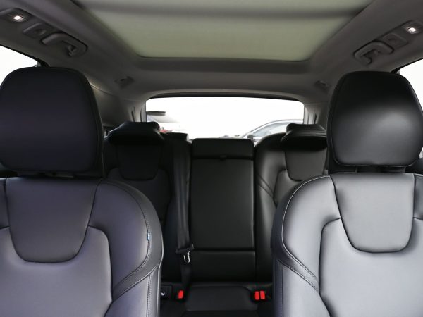 Panoramic moonroof view from inside the XC60, flooding the cabin with natural light.