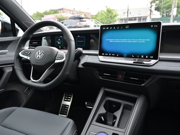 Close-up of the Tiguan’s digital cockpit and ambient lighting presets, emphasizing premium interior upgrades